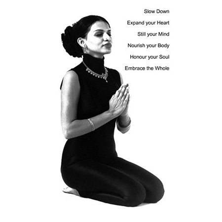 Annual yoga pass with shanti gowans in yoga posture in picture