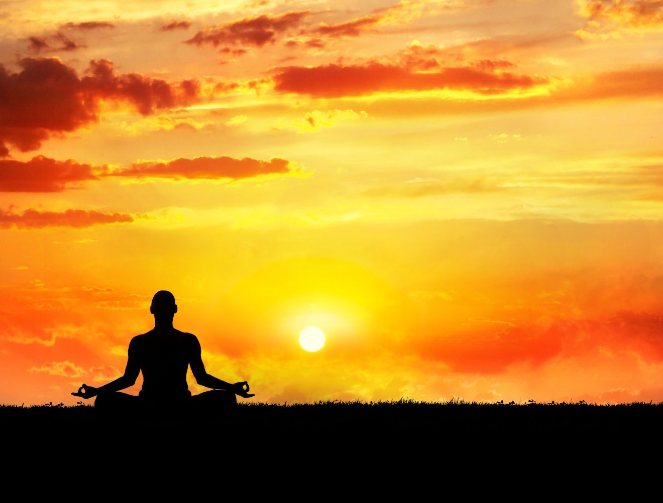 Yoga,Meditation,In,Lotus,Pose,By,Man,Silhouette,At,Sunset