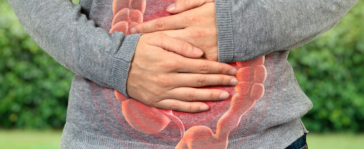person holding their stomach