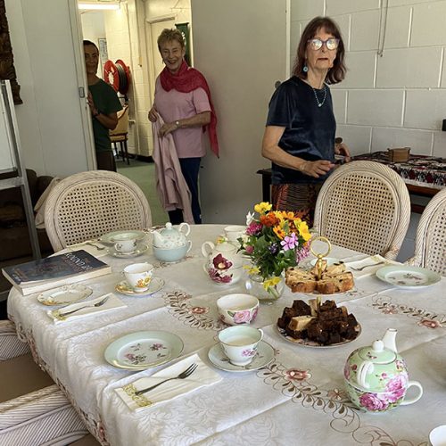 shanti yoga community monthly wellness hub with tea and cake