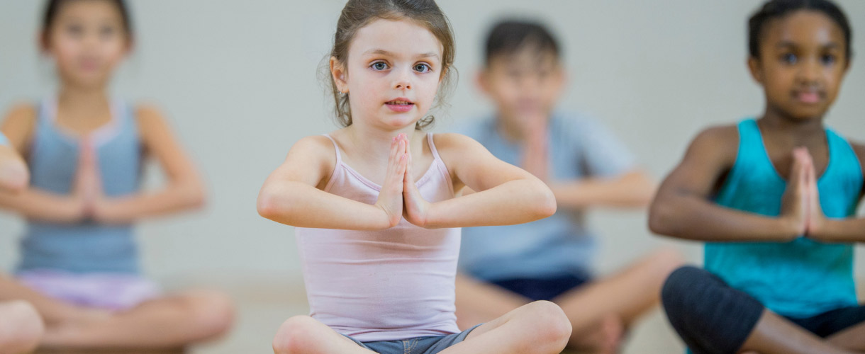 children learning yoga